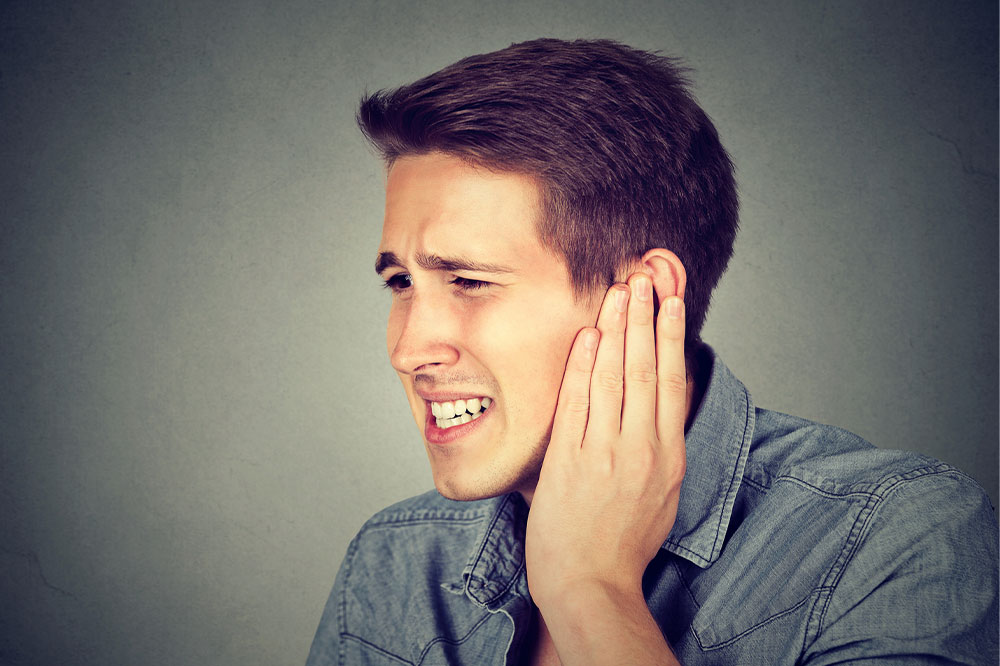 Common causes and symptoms of tinnitus